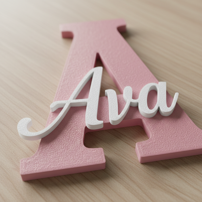 Close-up of the matte printed surface and raised name lettering on an initial plaque