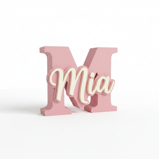 Matte pink 3D-printed initial name plaque with raised personalized lettering