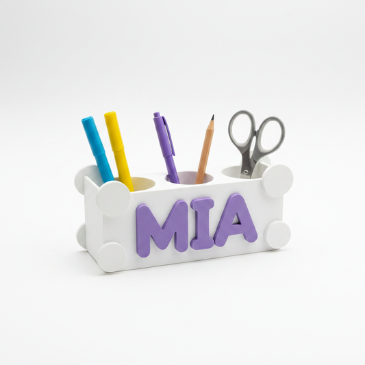 Personalized white 3D-printed desk organizer with colorful stationery